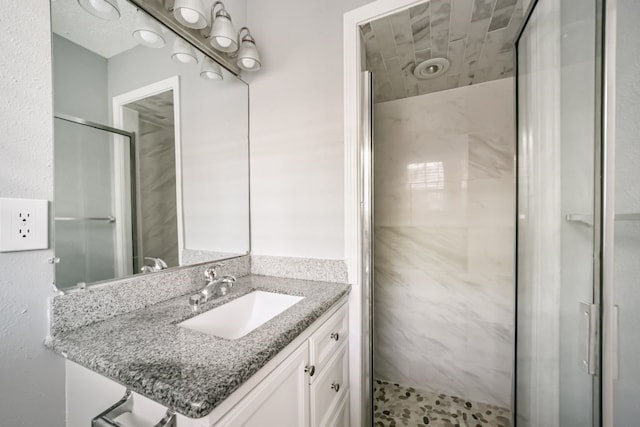 bathroom featuring vanity and walk in shower