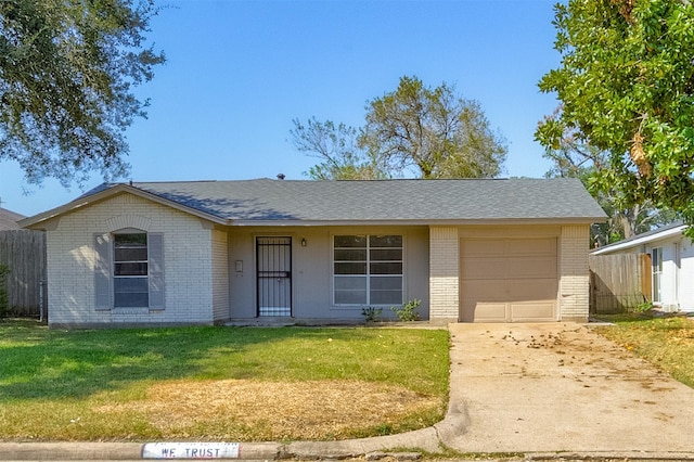 ranch-style house with a garage and a front lawn