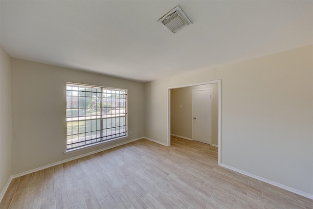 empty room featuring light hardwood / wood-style floors