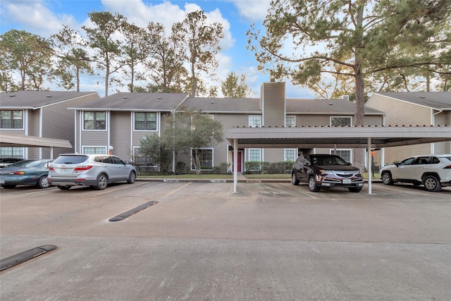 view of car parking with a carport