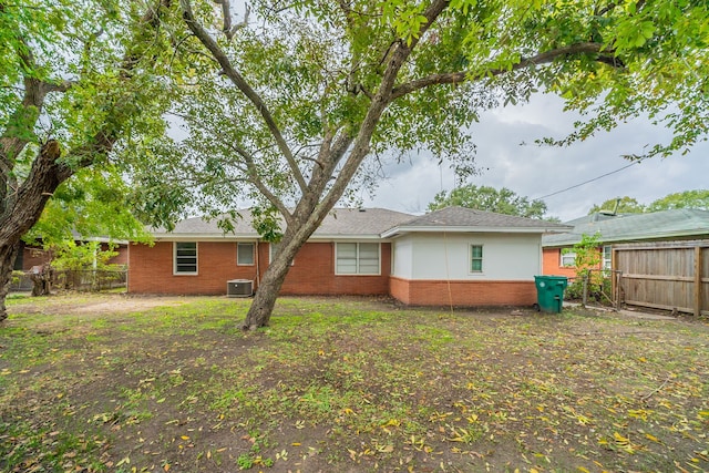 back of property with central AC unit