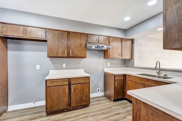 kitchen featuring sink and light hardwood / wood-style floors