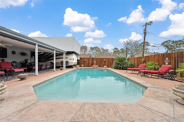 view of swimming pool featuring a patio area