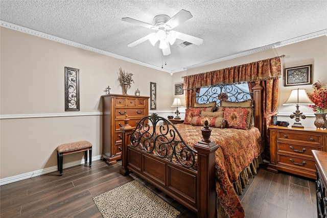 bedroom featuring ornamental molding, a textured ceiling, dark wood-type flooring, and ceiling fan