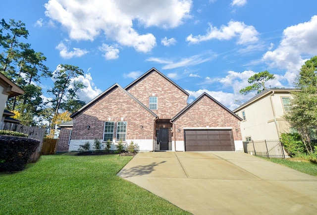 view of front of home with a garage and a front lawn