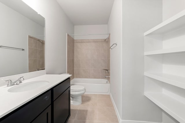 full bathroom featuring toilet, tile patterned flooring, vanity, and tiled shower / bath