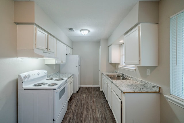 kitchen with white appliances, sink, dark hardwood / wood-style floors, a textured ceiling, and white cabinetry