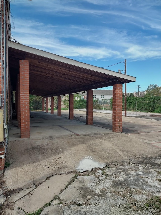 view of car parking featuring a carport