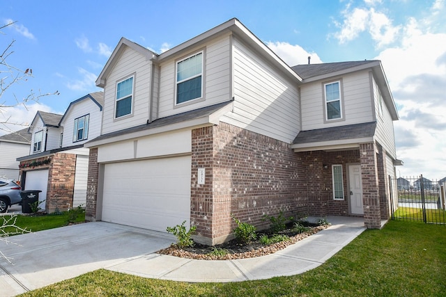 view of front facade featuring a front lawn and a garage