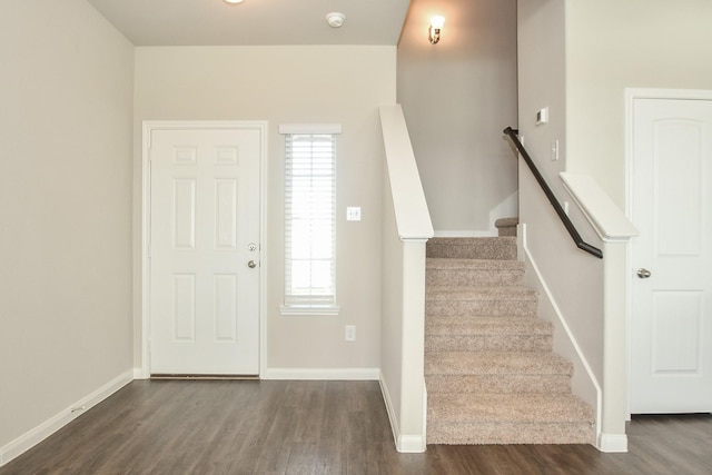 entrance foyer with dark hardwood / wood-style floors