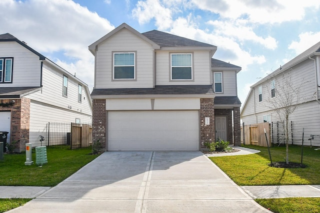 view of front of property with a garage and a front yard