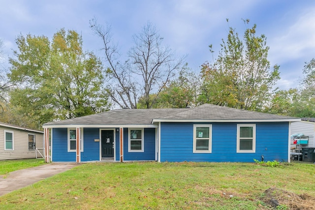 ranch-style house with a front lawn