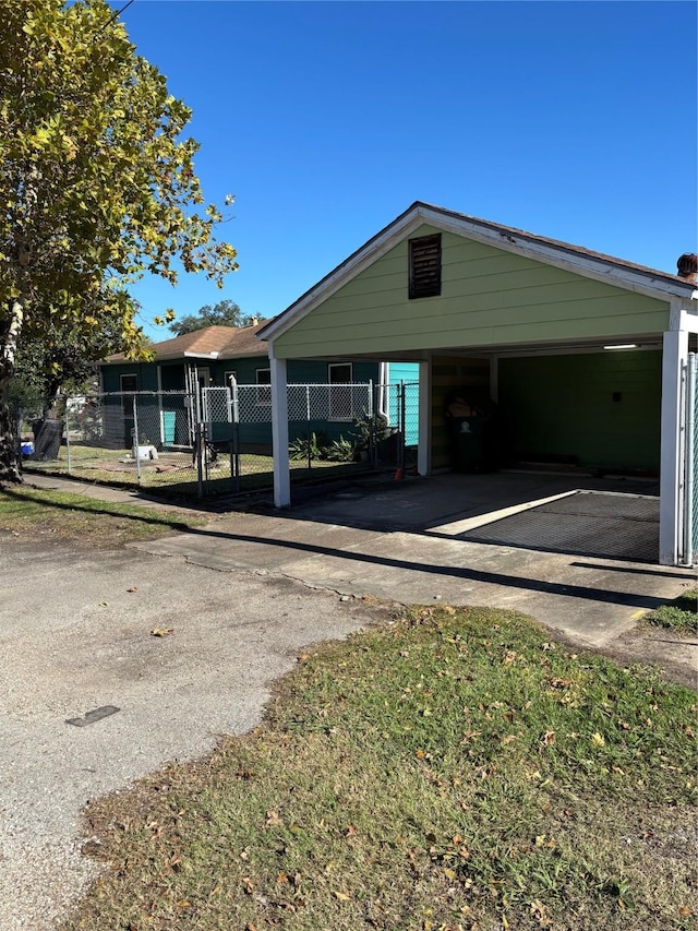 exterior space with a carport