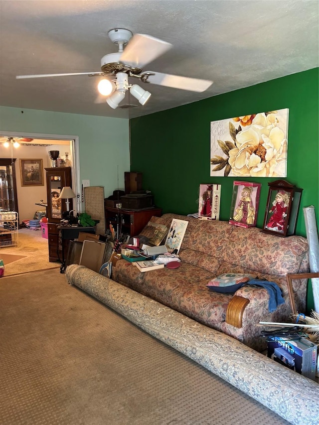 living room with carpet flooring and ceiling fan