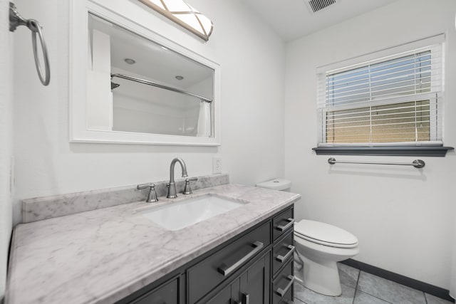 bathroom featuring tile patterned floors, vanity, toilet, and a shower with curtain