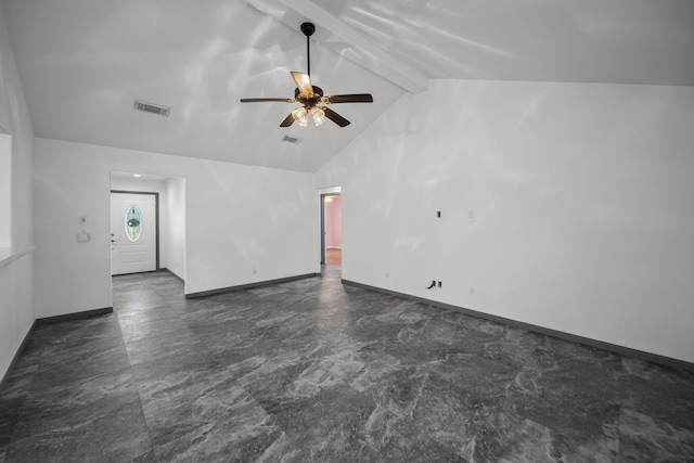 spare room with vaulted ceiling with beams and ceiling fan