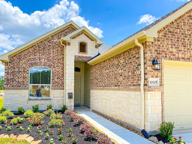 property entrance with a garage