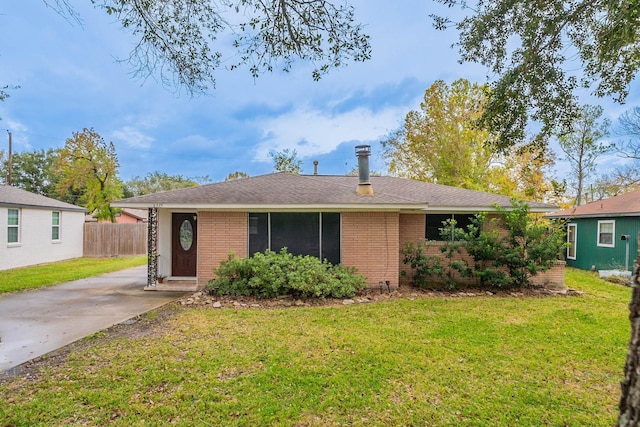 ranch-style home with a front yard