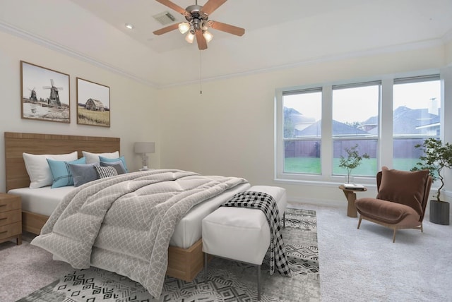 carpeted bedroom with ceiling fan and a mountain view