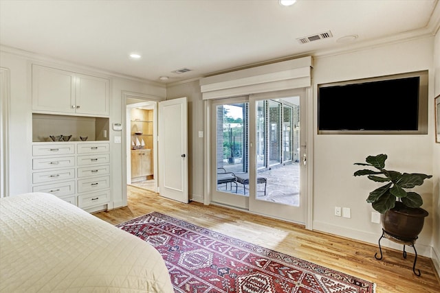 bedroom with access to exterior, light hardwood / wood-style floors, and crown molding