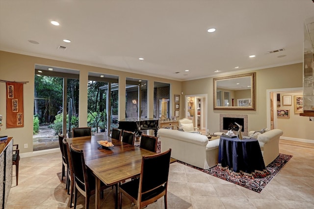 tiled dining room with ornamental molding