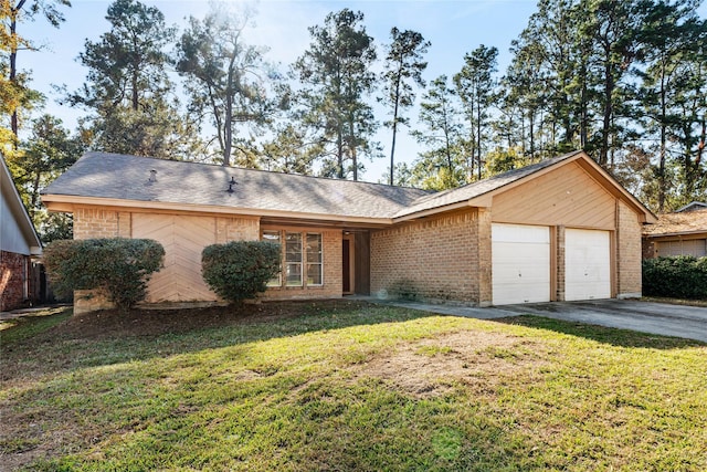 single story home featuring a garage and a front lawn