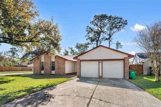 ranch-style home with a garage and a front yard