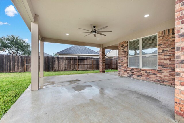 view of patio / terrace featuring a fenced backyard and ceiling fan