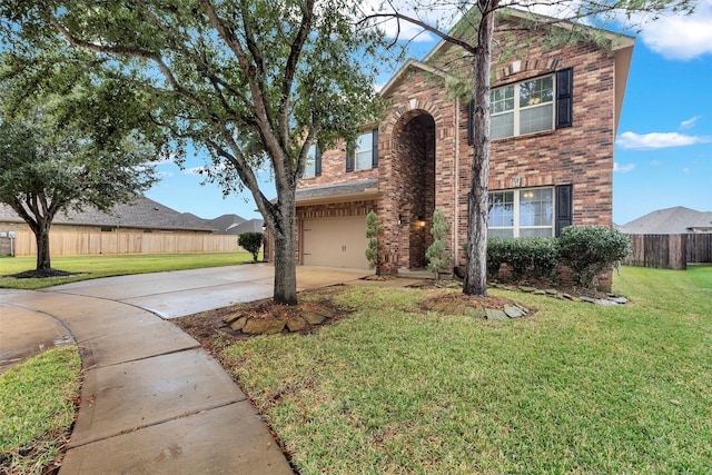 front facade featuring a front lawn and a garage