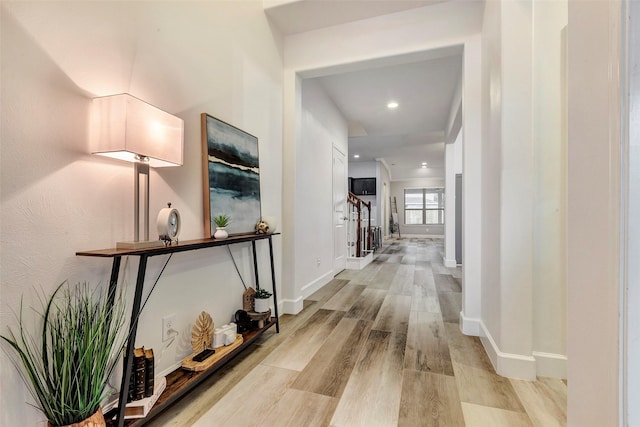 hallway featuring light wood-type flooring