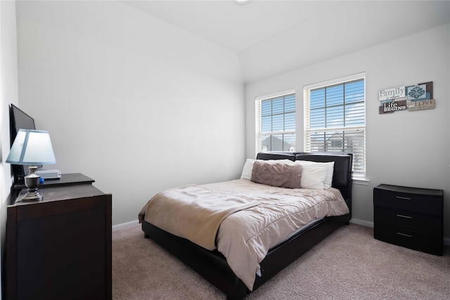 bedroom featuring light colored carpet