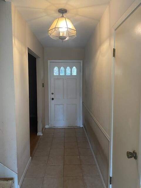 entryway featuring tile patterned flooring