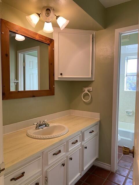 bathroom featuring vanity and tile patterned floors