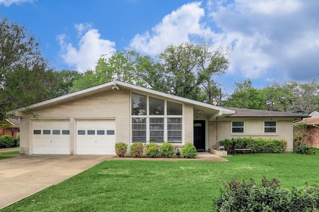 ranch-style home with a front lawn and a garage