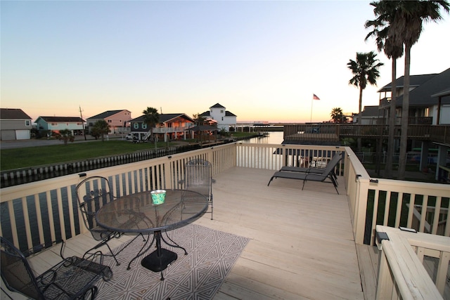 deck at dusk with a water view