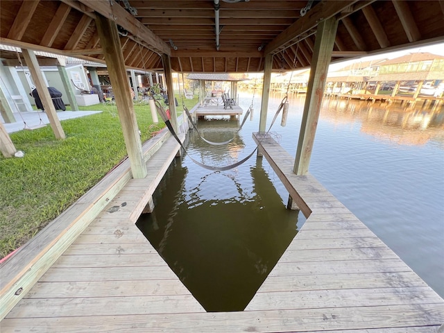 view of dock featuring a water view