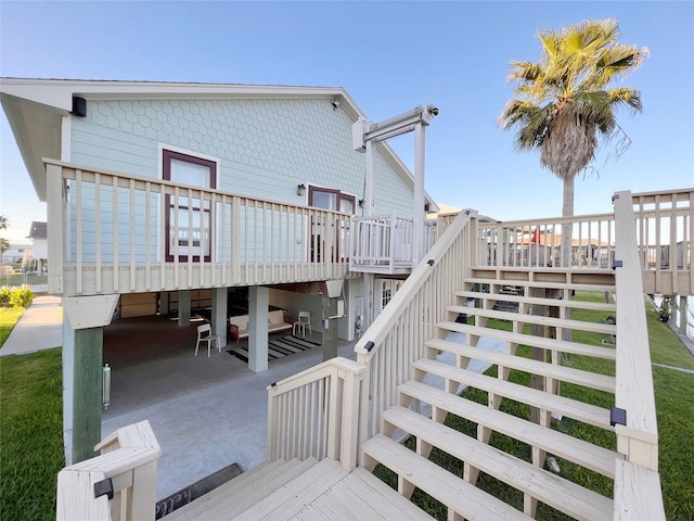 back of house with a wooden deck