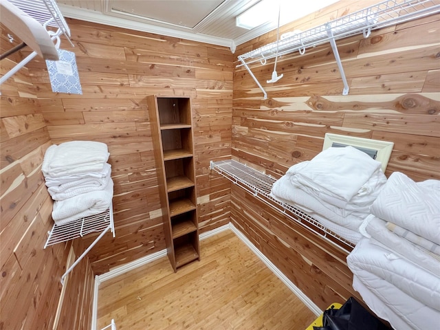 spacious closet featuring hardwood / wood-style floors