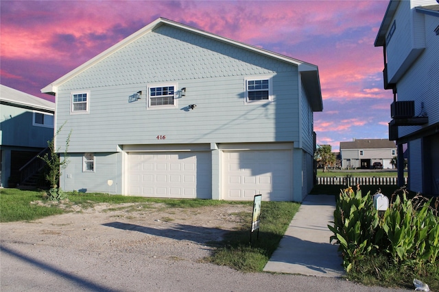 exterior space with a garage