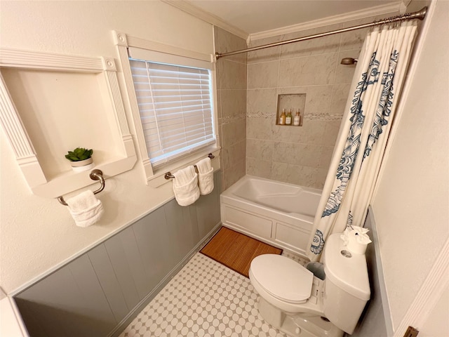 bathroom featuring shower / bath combination with curtain, toilet, and crown molding