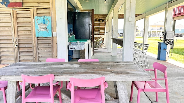 view of patio featuring a bar