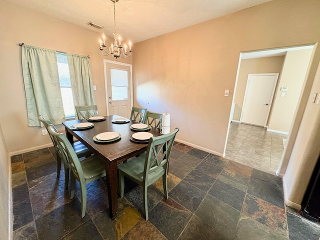 dining room with an inviting chandelier