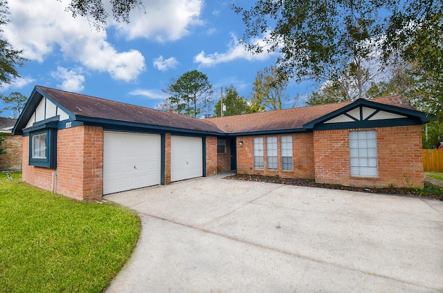 single story home featuring a garage