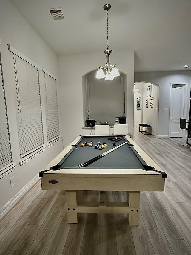 recreation room with light hardwood / wood-style floors and pool table