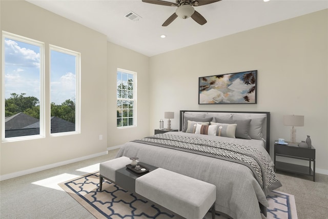 carpeted bedroom with ceiling fan