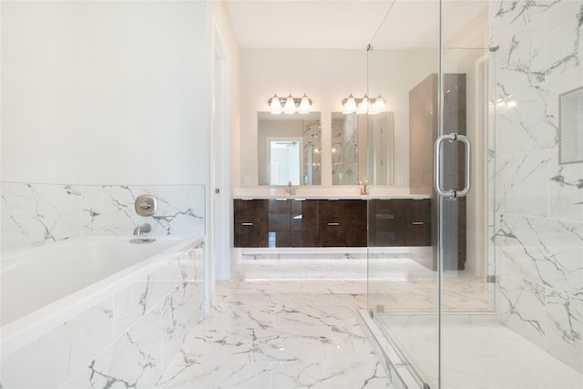 bathroom with a chandelier, vanity, and independent shower and bath