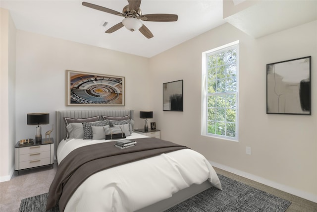 carpeted bedroom featuring ceiling fan