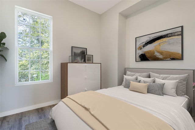 bedroom featuring hardwood / wood-style flooring