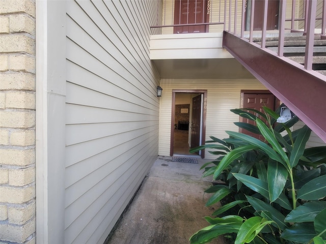 property entrance with a balcony