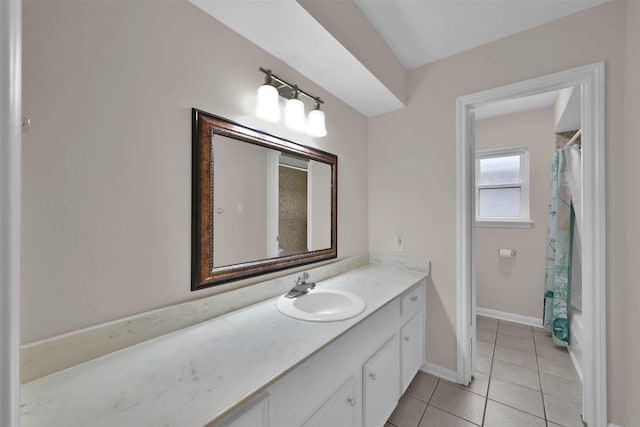 bathroom featuring tile patterned floors, vanity, and a shower with curtain